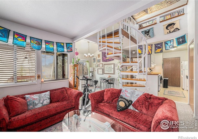 4501 E Boardwalk Dr Unit A9, Fort Collins, CO 80525 - living room featuring a chandelier, a textured ceiling, and stairway