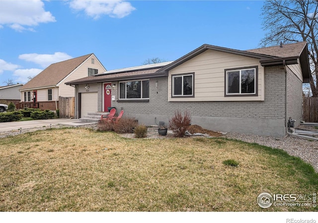 9331 Irving St, Westminster, CO 80031 - single story home with a front lawn, an attached garage, brick siding, and concrete driveway