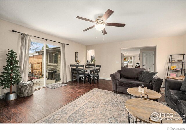9331 Irving St, Westminster, CO 80031 - living room featuring baseboards, wood finished floors, and a ceiling fan