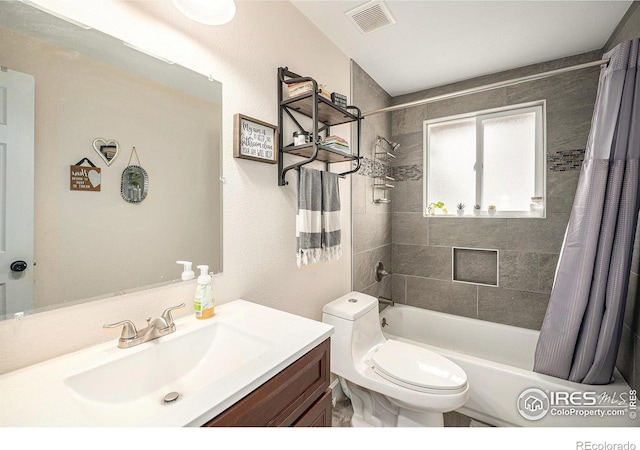 9331 Irving St, Westminster, CO 80031 - full bath featuring toilet, shower / bath combo, vanity, and visible vents