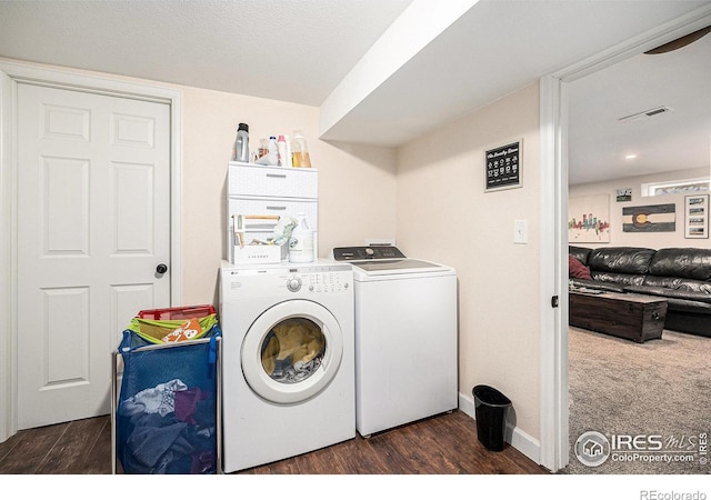 9331 Irving St, Westminster, CO 80031 - washroom with wood finished floors, washer and dryer, laundry area, and visible vents