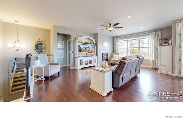 6820 Rainier Rd, Timnath, CO 80547 - living area with a chandelier, dark wood finished floors, ceiling fan, recessed lighting, and baseboards