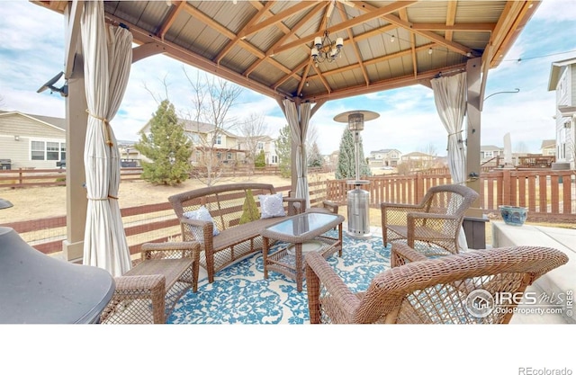 6820 Rainier Rd, Timnath, CO 80547 - view of patio with a gazebo and fence