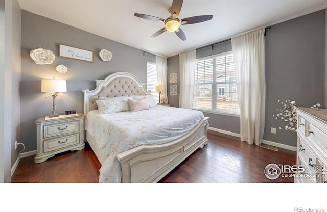 6820 Rainier Rd, Timnath, CO 80547 - bedroom with wood finished floors and ceiling fan