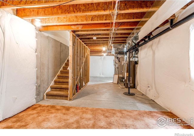 828 Kane Dr Unit 35, Longmont, CO 80501 - unfinished basement with stairway