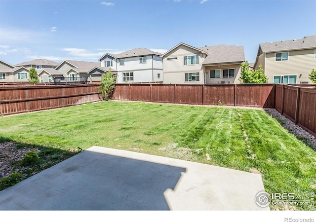 2113 Day Spring Dr, Windsor, CO 80550 - view of yard with a residential view and a patio