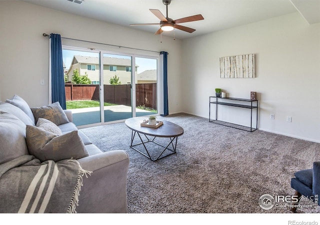 2113 Day Spring Dr, Windsor, CO 80550 - living room featuring carpet, a ceiling fan, and baseboards