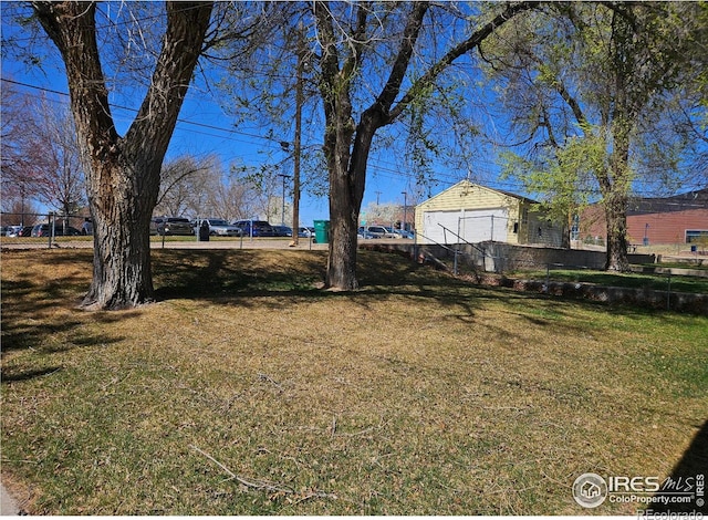 2211 10th Ave, Greeley, CO 80631 - view of yard with a garage and fence
