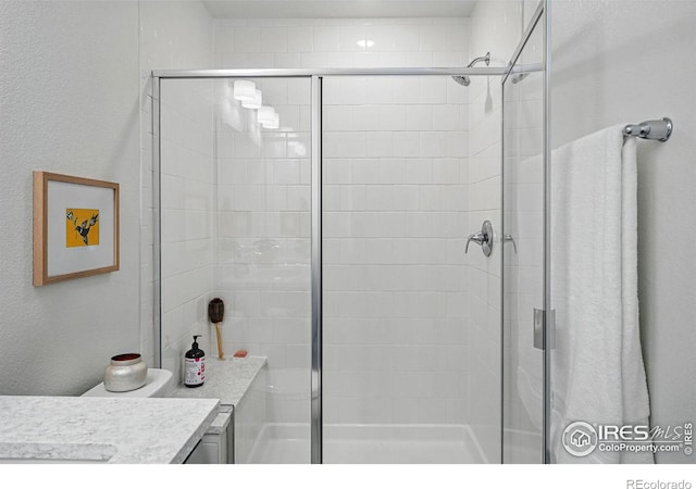 1365 Shale Dr, Erie, CO 80516 - full bathroom with a shower stall and vanity