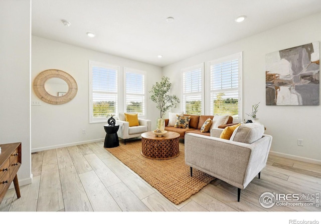 1365 Shale Dr, Erie, CO 80516 - living room featuring light wood-style floors and recessed lighting