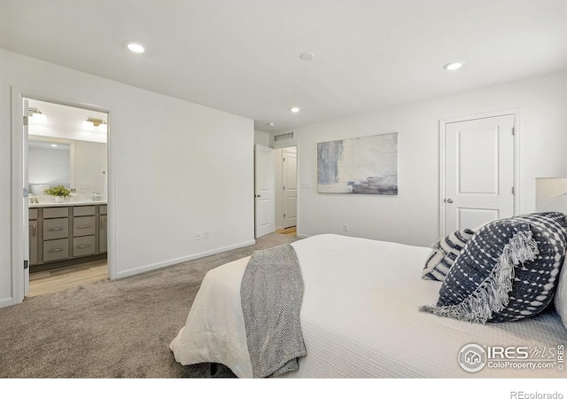 1365 Shale Dr, Erie, CO 80516 - bedroom featuring light colored carpet, recessed lighting, and connected bathroom