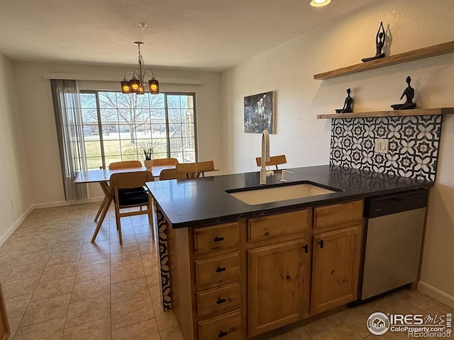 585 Callisto Dr, Loveland, CO 80537 - kitchen featuring an inviting chandelier, open shelves, dishwasher, a sink, and dark countertops
