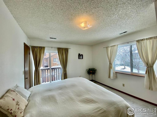 6239 Willow Ln, Boulder, CO 80301 - unfurnished bedroom with visible vents, carpet floors, and multiple windows