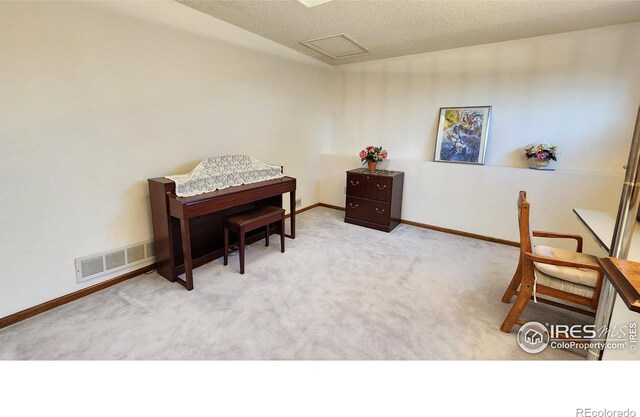 6239 Willow Ln, Boulder, CO 80301 - sitting room with a textured ceiling, attic access, baseboards, carpet flooring, and visible vents