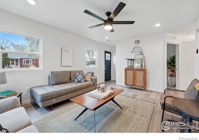 234 Lyons St, Fort Collins, CO 80521 - living room featuring recessed lighting, light wood-style flooring, visible vents, and a ceiling fan