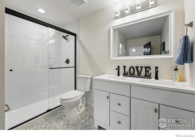 234 Lyons St, Fort Collins, CO 80521 - full bathroom with a sink, visible vents, toilet, and a stall shower