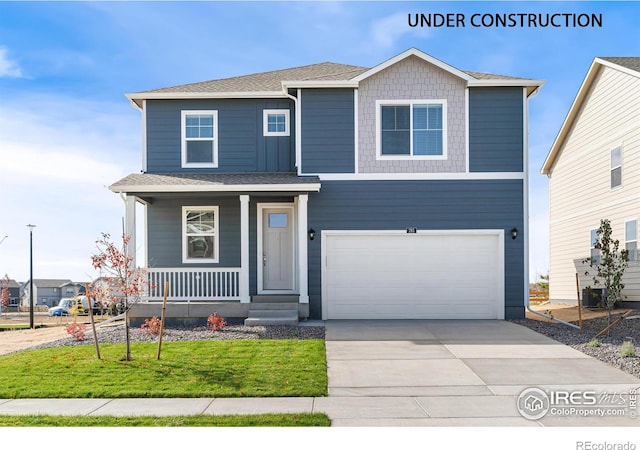 view of front of property with an attached garage, roof with shingles, covered porch, and driveway