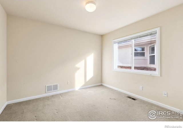 7747 Promontory Dr, Windsor, CO 80528 - carpeted empty room featuring baseboards