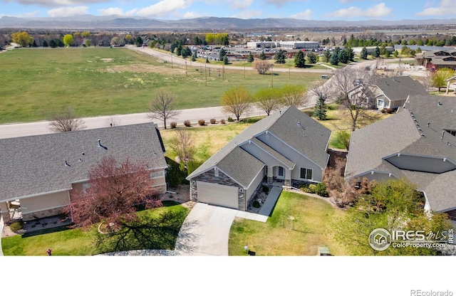 7747 Promontory Dr, Windsor, CO 80528 - view of subject property featuring a mountain backdrop