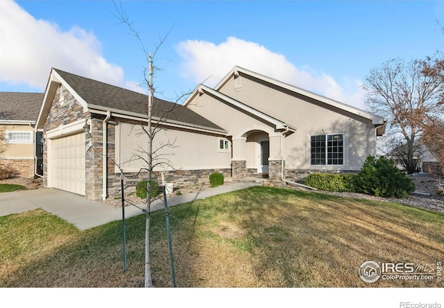 7747 Promontory Dr, Windsor, CO 80528 - ranch-style house with stone siding, an attached garage, a front lawn, concrete driveway, and stucco siding