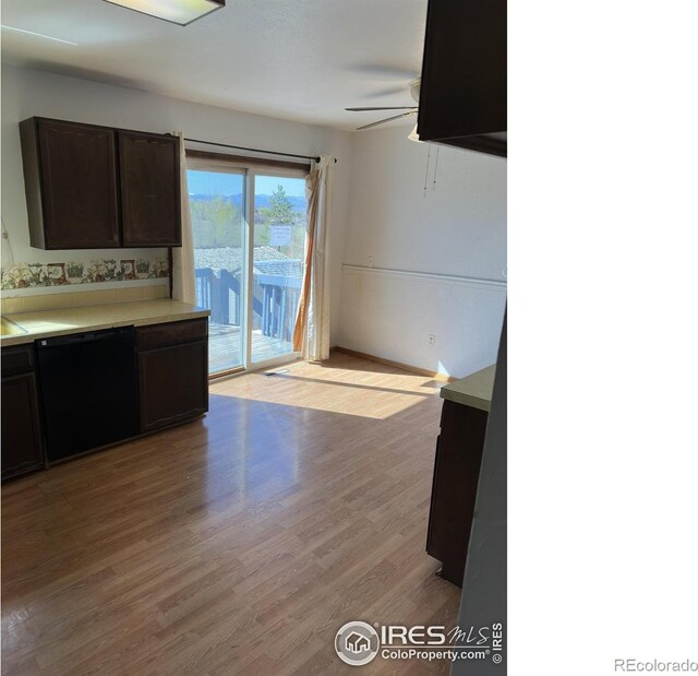 kitchen with light wood-style flooring, light countertops, dark brown cabinets, ceiling fan, and dishwasher