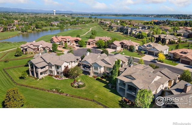 6701 Clovis Ct, Timnath, CO 80547 - aerial perspective of suburban area with a nearby body of water