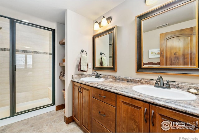 6701 Clovis Ct, Timnath, CO 80547 - full bathroom featuring double vanity, a shower stall, and toilet