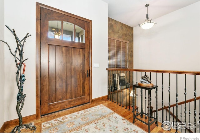 6701 Clovis Ct, Timnath, CO 80547 - foyer with wood finished floors
