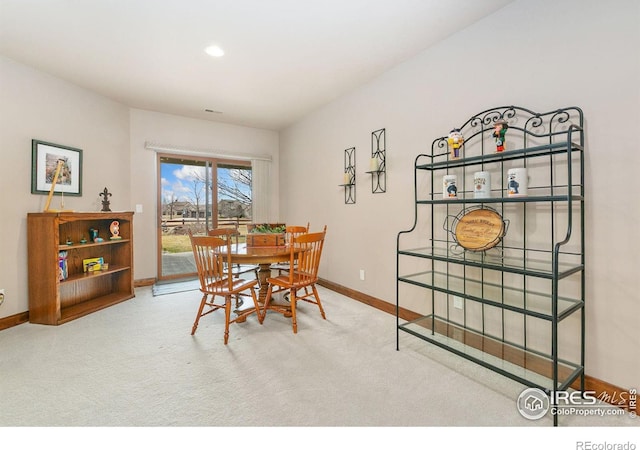 6701 Clovis Ct, Timnath, CO 80547 - dining room with carpet floors, baseboards, and recessed lighting