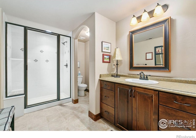6701 Clovis Ct, Timnath, CO 80547 - full bath with vanity, a stall shower, toilet, and tile patterned floors