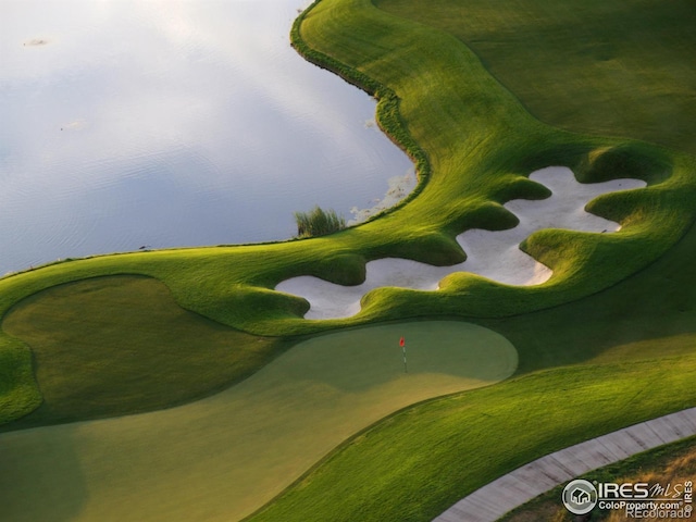 6701 Clovis Ct, Timnath, CO 80547 - view of home's community with golf course view and a water view