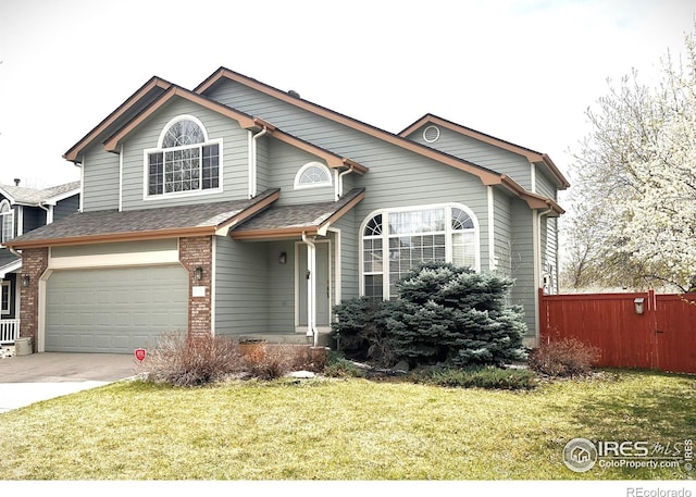 traditional home with a garage, concrete driveway, brick siding, and roof with shingles