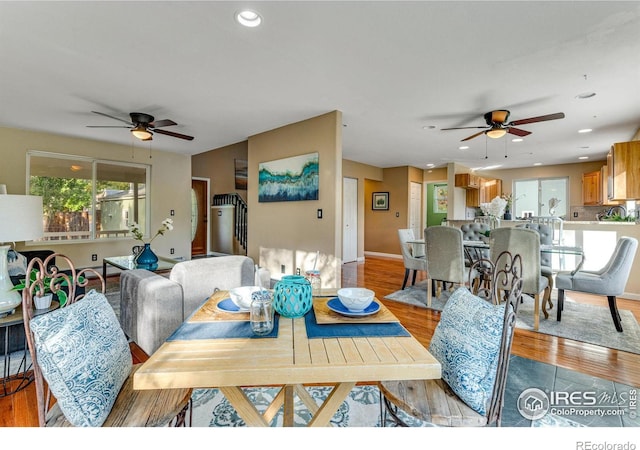 217 Park St, Lyons, CO 80540 - dining room featuring ceiling fan, wood finished floors, baseboards, and recessed lighting