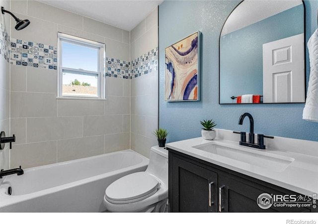 217 Park St, Lyons, CO 80540 - bathroom with toilet, vanity, shower / washtub combination, and a textured wall