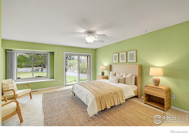 bedroom featuring ceiling fan, access to exterior, baseboards, and carpet floors
