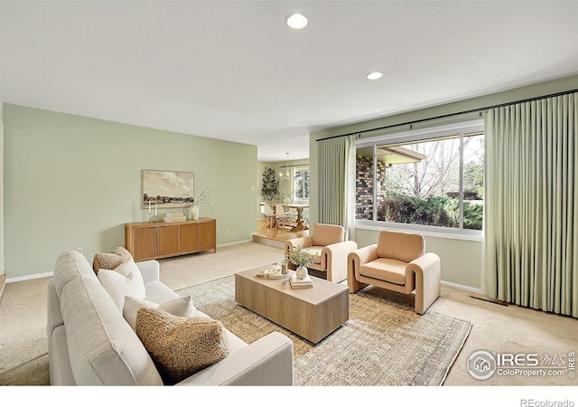 living area with light colored carpet, baseboards, and recessed lighting