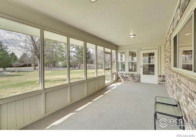 unfurnished sunroom with a healthy amount of sunlight