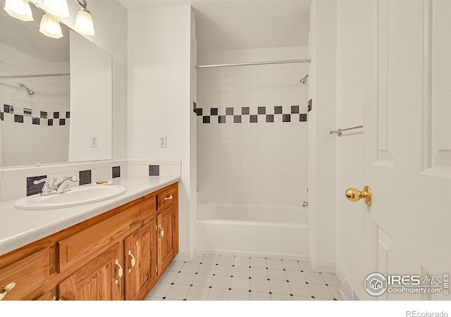 bathroom featuring shower / bath combination and vanity