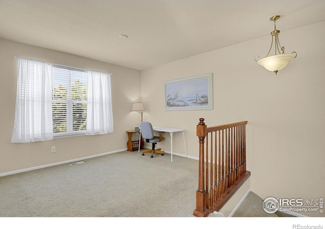 home office featuring carpet floors and baseboards