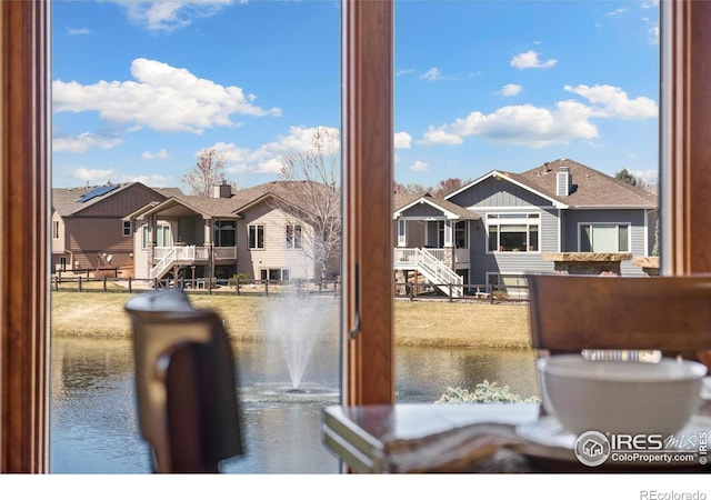 6741 Bandon Dunes Dr, Windsor, CO 80550 - property view of water featuring a residential view