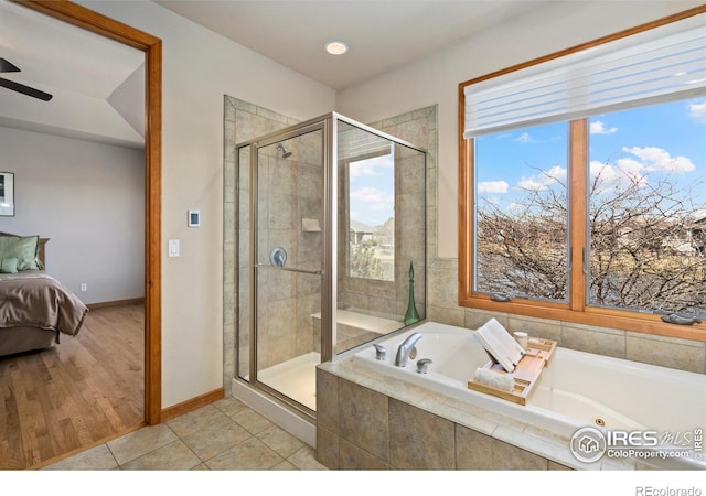 6741 Bandon Dunes Dr, Windsor, CO 80550 - full bathroom with tile patterned floors, a bath, a stall shower, and ensuite bathroom