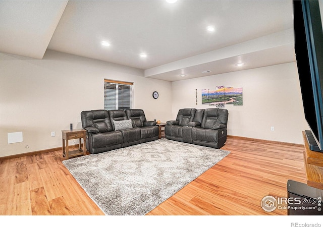 6741 Bandon Dunes Dr, Windsor, CO 80550 - living area with recessed lighting, baseboards, and wood finished floors