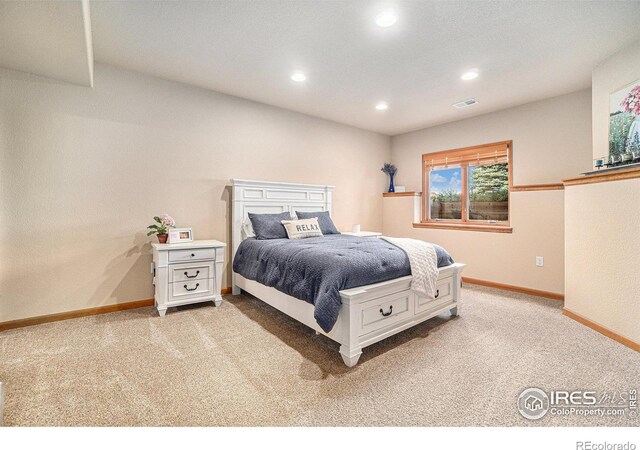 6741 Bandon Dunes Dr, Windsor, CO 80550 - bedroom with visible vents, baseboards, recessed lighting, and carpet flooring