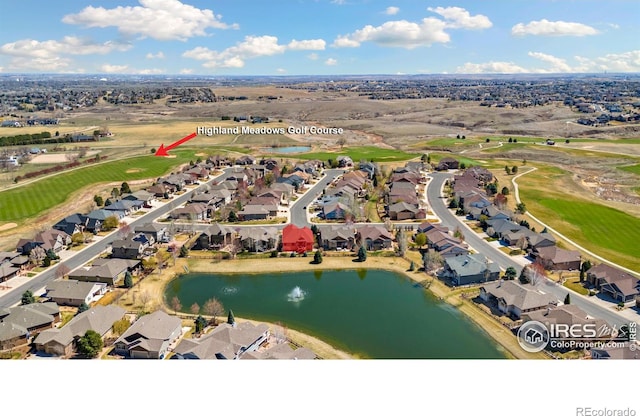 6741 Bandon Dunes Dr, Windsor, CO 80550 - aerial view featuring a water view, a residential view, and golf course view