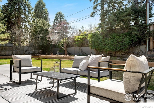 545 S Harrison Ln, Denver, CO 80209 - deck with a fenced backyard, a lawn, and outdoor lounge area