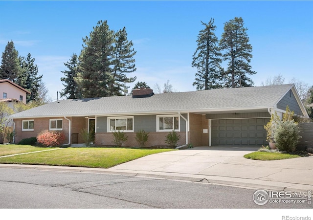545 S Harrison Ln, Denver, CO 80209 - ranch-style house featuring an attached garage, a front lawn, brick siding, a chimney, and concrete driveway