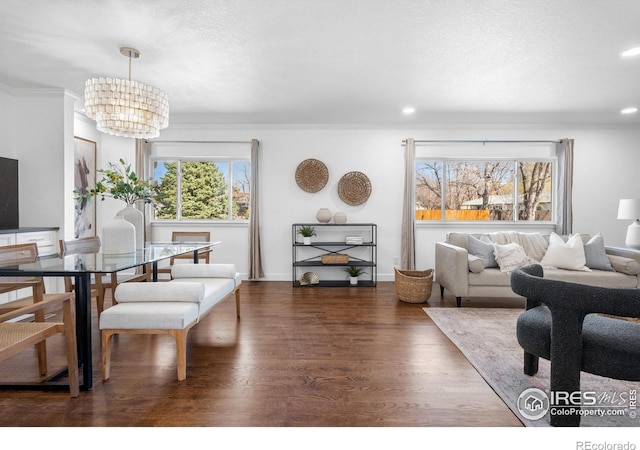 545 S Harrison Ln, Denver, CO 80209 - dining space with an inviting chandelier, crown molding, recessed lighting, and wood finished floors