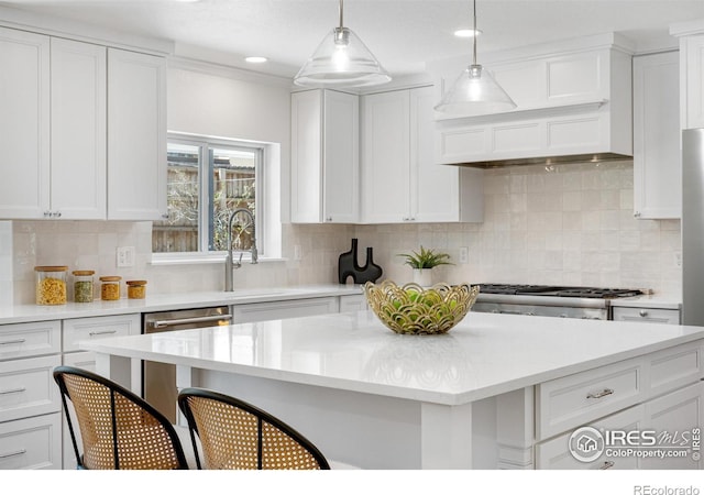 545 S Harrison Ln, Denver, CO 80209 - kitchen featuring light countertops and white cabinetry
