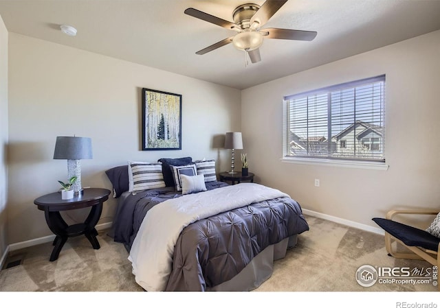 61 Avocet Ct, Longmont, CO 80501 - bedroom featuring light carpet, baseboards, and a ceiling fan