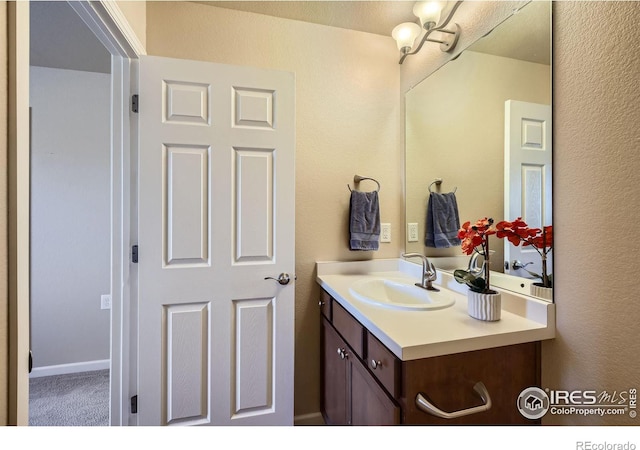 61 Avocet Ct, Longmont, CO 80501 - bathroom featuring vanity